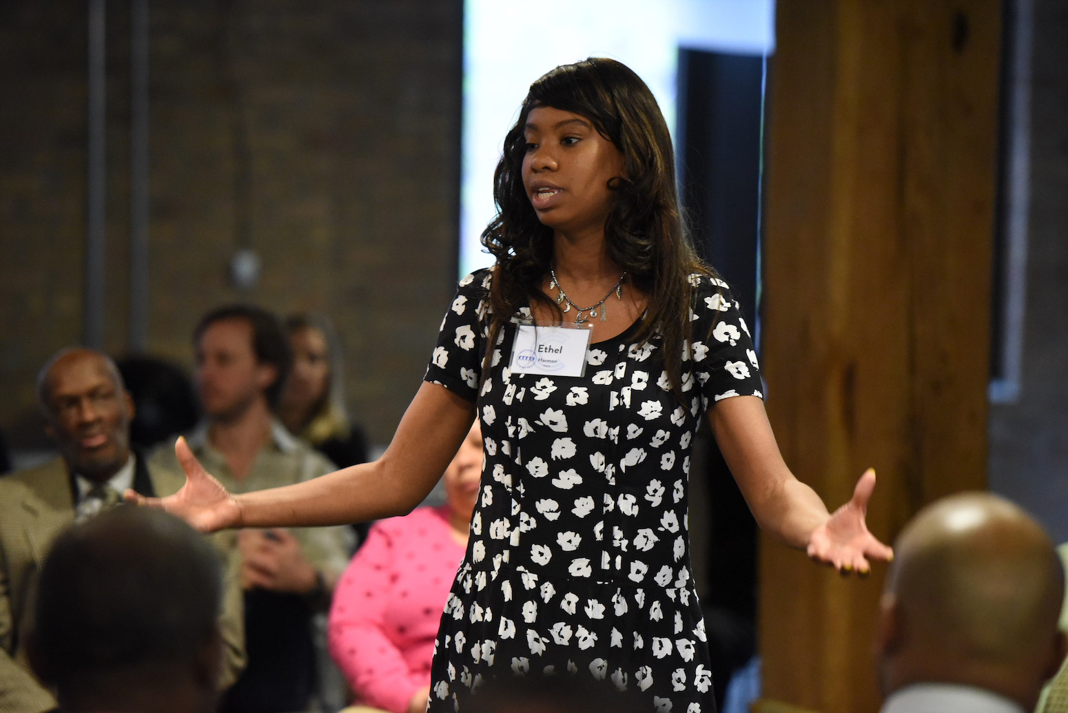 How to Join Cara for Job Search Support - Woman speaking to group